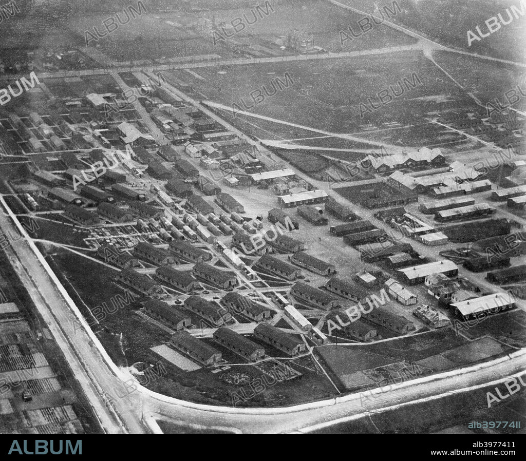Lydd Military Training Camp, Kent, February 1920. Aerial view. This photograph indicates the extent of the First World War barracks. The camp and firing ranges here were set up in 1881, with the first permanent buildings erected in 1906. It was used for weapons training, especially artillery, for experiments with explosives, and for tank trials. Lydd Range is still in use by the Army for weapons training.