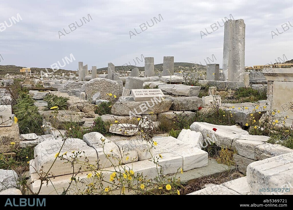 Ruins of small temple at square called Agora of Competaliasts, Delos, Greece