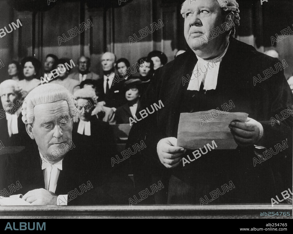 CHARLES LAUGHTON and JOHN WILLIAMS in WITNESS FOR THE PROSECUTION, 1957, directed by BILLY WILDER. Copyright UNITED ARTISTS.