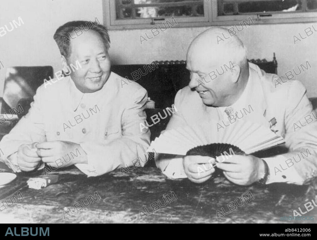 Mao Zedong, half-length portrait, seated, facing Nikita Khrushchev, during the Russian leader's visit to Beijing.