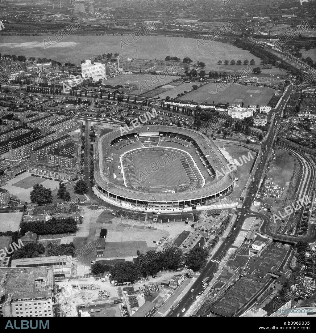 White City Stadium, London, July 1966. Originally built for the 1908 summer Olympics, it became the home of greyhound racing and hosted a number of other sports. It is shown here set up for athletics. Two weeks later it played host to the World Cup football match between Uruguay and France. The stadium was demolished in 1985.