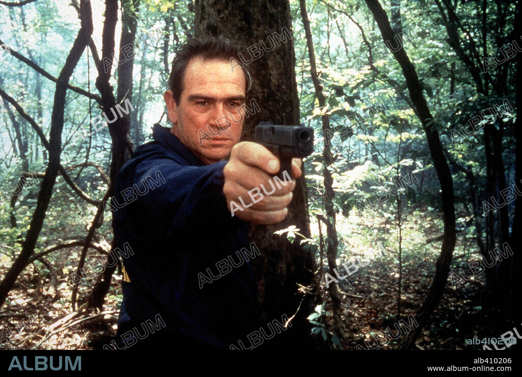 TOMMY LEE JONES en U. S. MARSHALS, 1998, dirigida por STUART BAIRD. Copyright WARNER BROTHERS / WEINSTEIN, MICHAEL.