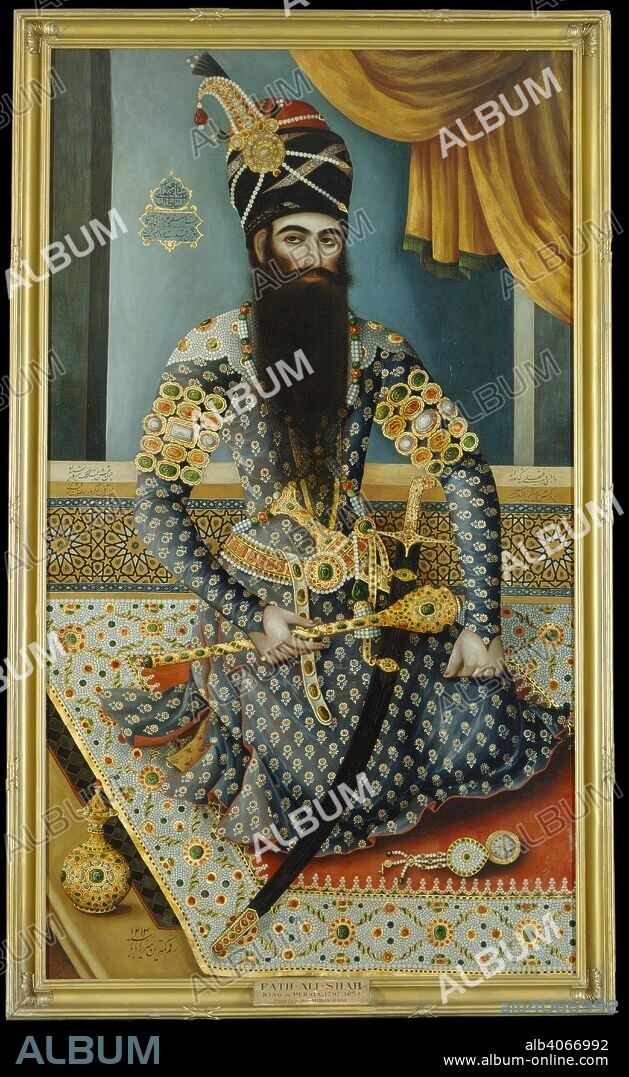 MIRZA BABA. Fath 'Ali Shah. 1798-1799. Fath 'Ali Shah, King of Persia 1797-1834. The Shah is shown sitting on a rich carpet, wearing a tight fitting blue costume thickly adorned with jewels. Oil on canvas.  Originally published/produced in 1798-1799. . Source: Foster 116,.