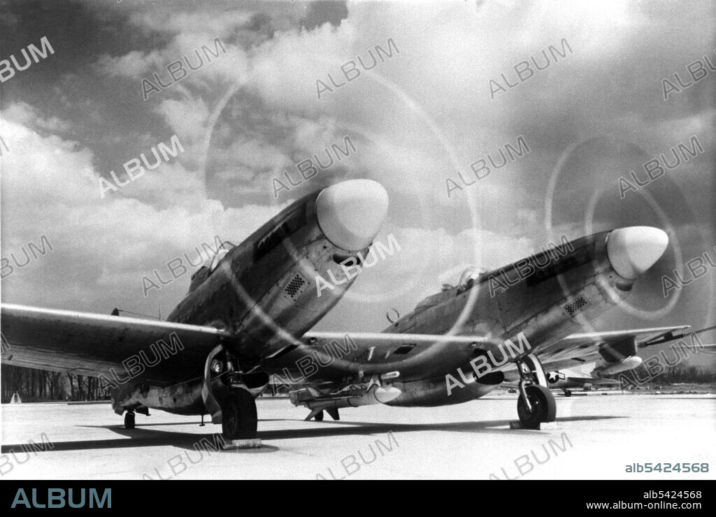 XP-82 (XF-82) Twin Mustang, Langley Research Center, Virginia, USA, 5 May 1951. In the early 1950s, the National Advisory Committee for Aeronautics used this XP-82 Twin Mustang for its drop-body tests. A test body is shown in the rack underneath the Twin Mustang's center wing section. NACA 114 was the first Twin Mustang built, and was turned over to the Langley Memorial Aeronautical Laboratory following introduction of the type into regular Air Force service.
