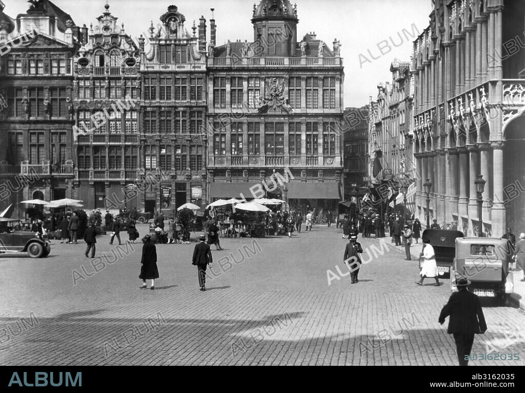 Brussels, Belgium: c. 1926. The Grand Place in Brussels. To the right is the House of the King, and to the rear are the old Guild houses.