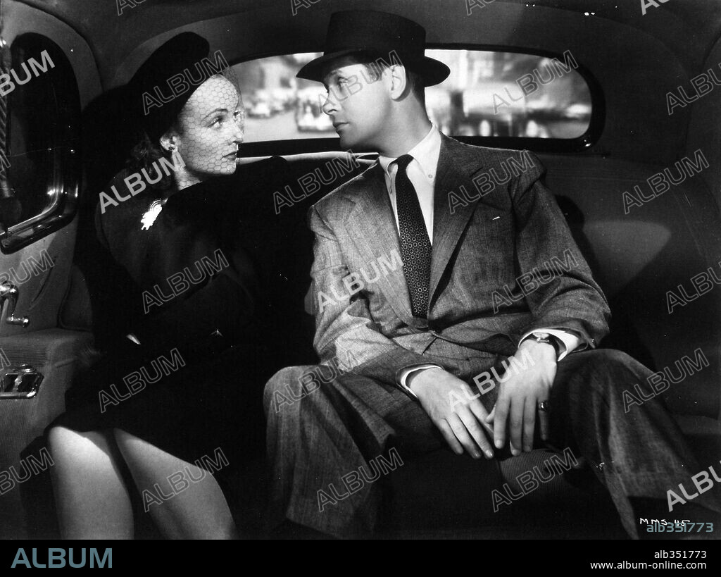 CAROLE LOMBARD und ROBERT MONTGOMERY in MR. & MRS. SMITH, 1941, unter der Regie von ALFRED HITCHCOCK. Copyright RKO.