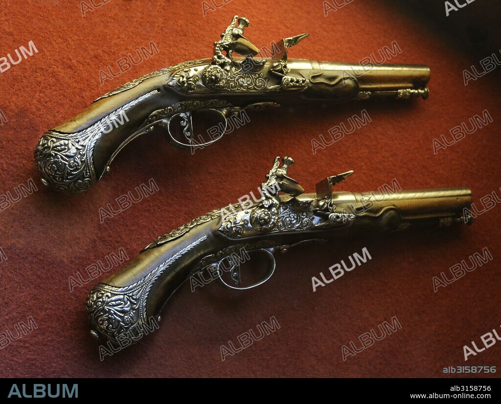 Pair of flintlock pistols. By Lazarino Cominazzo, Ca. 1650.  Steel and wood. The State Hermitage Museum. Saint Petersburg. Russia.