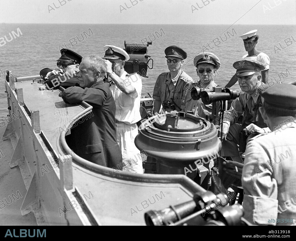 On board the destroyer HMS Kimberley, Mr. Churchill watching South France invasion. The Prime Minister, general Somerville from US Army and Mr Patterson, US under secretary for war also watching the landings. From 14th to 16th  August 1944.