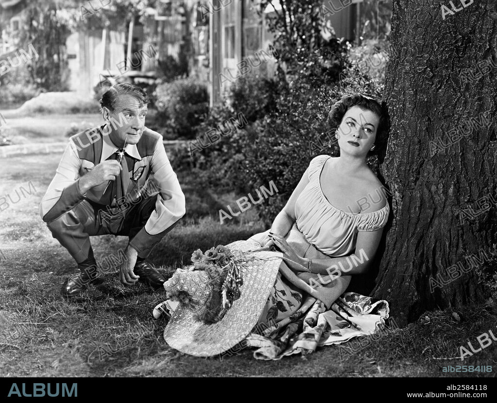 CLIFTON WEBB and JOAN BENNETT in FOR HEAVEN'S SAKE, 1950, directed by GEORGE SEATON. Copyright 20TH CENTURY FOX.