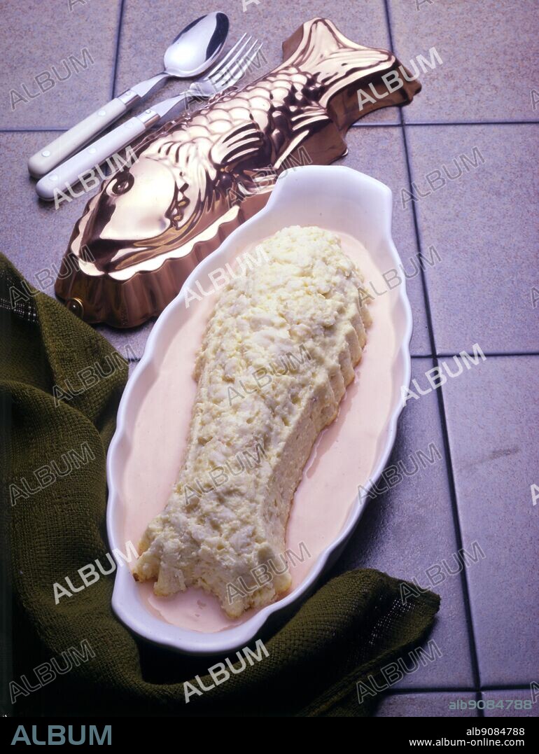Pain de Poisson. Hot fish mousse with tomato cream sauce.