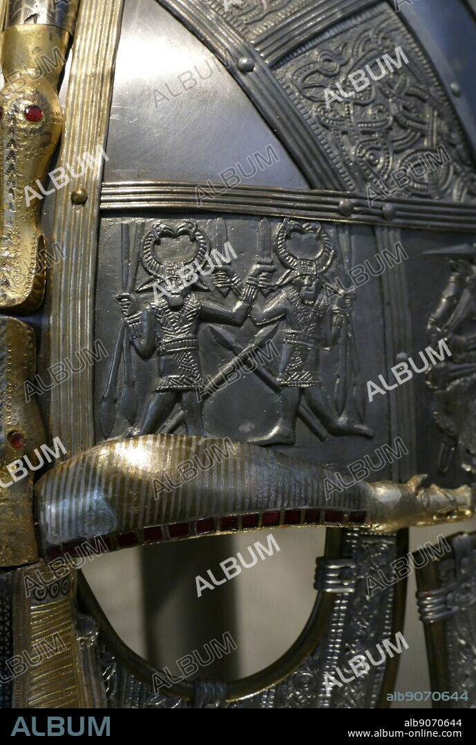 reconstruction of the Sutton Hoo helmet, a decorated Anglo-Saxon helmet discovered during the 1939 excavation of the Sutton Hoo ship-burial. Buried around 625 AD. it is believed to have been the helmet of King Raedwald; for whom its elaborate decoration may have given it a secondary function almost akin to a crown.