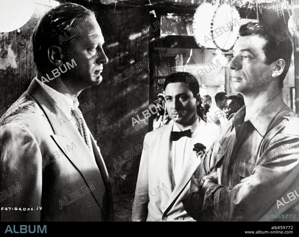 Curd Jurgens, YVES MONTAND y GERARD OURY. CURD JüRGENS, GERARD OURY y YVES MONTAND en LOS HÉROES ESTÁN CANSADOS, 1955 (LES HEROS SONT FATIGUES), dirigida por YVES CIAMPI. Copyright TERRA FILMS.