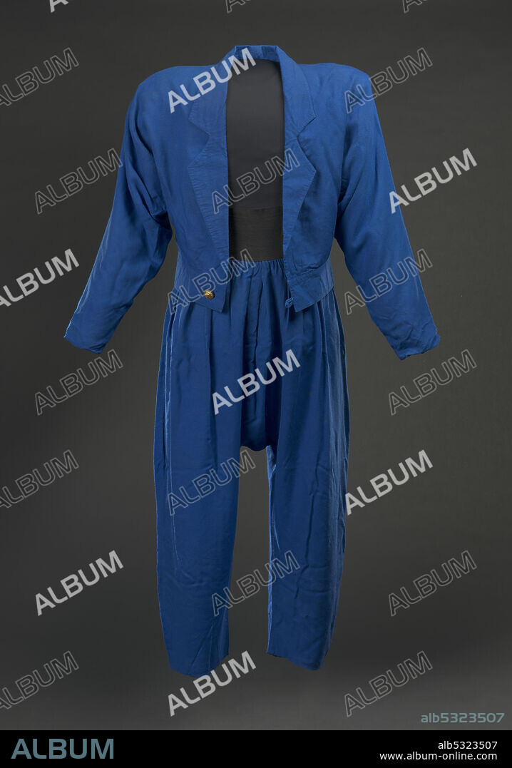 This blue jacket and Hammer pants were worn by African-American rapper and dancer MC Hammer in the 1988 music video for his song "They Put Me in the Mix.".