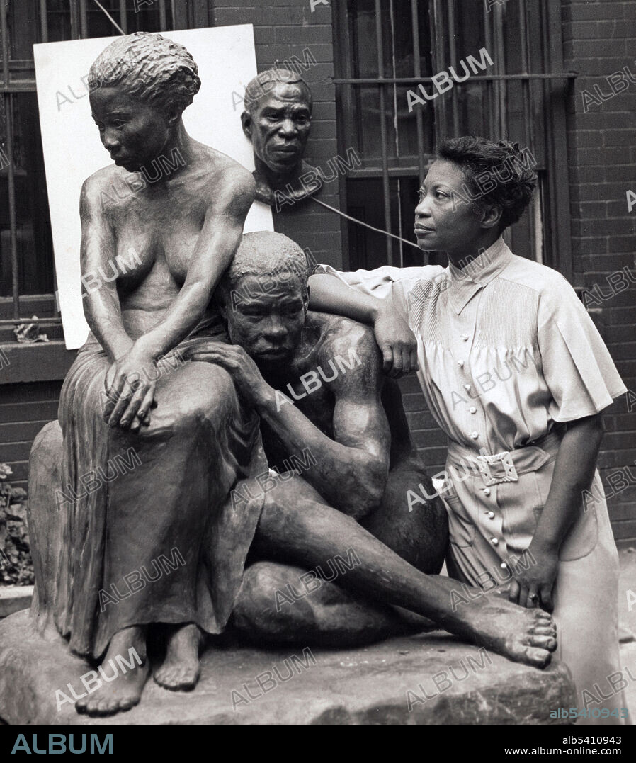 Savage with her sculpture, Realization. Augusta Savage (February 29, 1892 - March 27, 1962) was an African-American sculptor associated with the Harlem Renaissance. The Savage Studio of Arts and Crafts, located in a basement on West 143rd Street in Harlem, was open to anyone who wanted to paint, draw, or sculpt. She was the first African-American artist to be elected to the National Association of Women Painters and Sculptors and one of four women and only two African-Americans to receive a professional commission from the Board of Design of the 1939 New York World's Fair. Much of her work is in clay or plaster, as she could not often afford bronze. Herman, 1936 (cropped and cleaned).