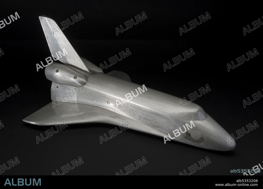 Model, Space Shuttle, Final Orbiter Concept, 1970s-2000s. NASA used this Space Shuttle orbiter concept model in wind tunnel tests to learn about the flight characteristics of the vehicle's shape. Although the orbiter would spend most of its time in space, its aerodynamic shape would affect its passage through the atmosphere during launch and descent. Straight wing designs were considered and tested; however a delta wing design was finally chosen, in part to meet U.S. Air Force requirements for high cross-range maneuverability during final descent. Delta wings meant a heavier orbiter and more surface heating during reentry, but they also permitted the orbiter to glide farther without power to reach a runway. NASA transferred a variety of wind tunnel and concept models to the Museum after settling on the final Space Shuttle design.