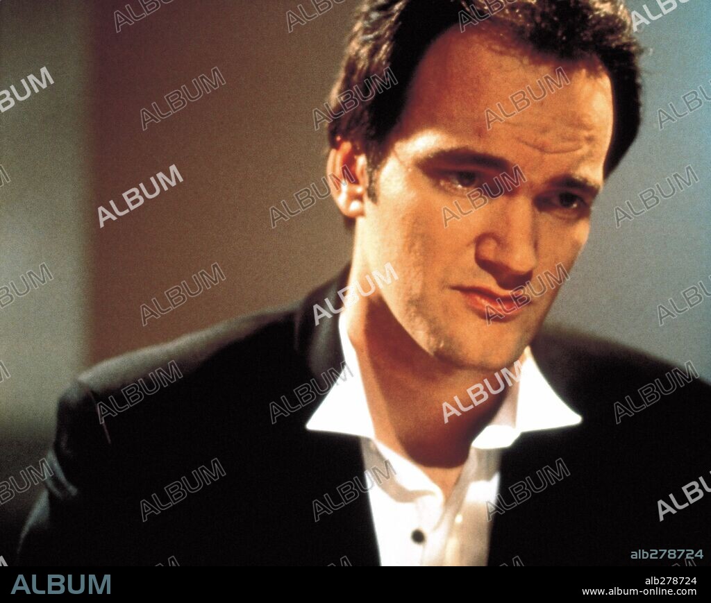 QUENTIN TARANTINO in FOUR ROOMS, 1995, directed by ALEXANDRE ROCKWELL, ALLISON ANDERS, QUENTIN TARANTINO and ROBERT RODRIGUEZ. Copyright MIRAMAX.