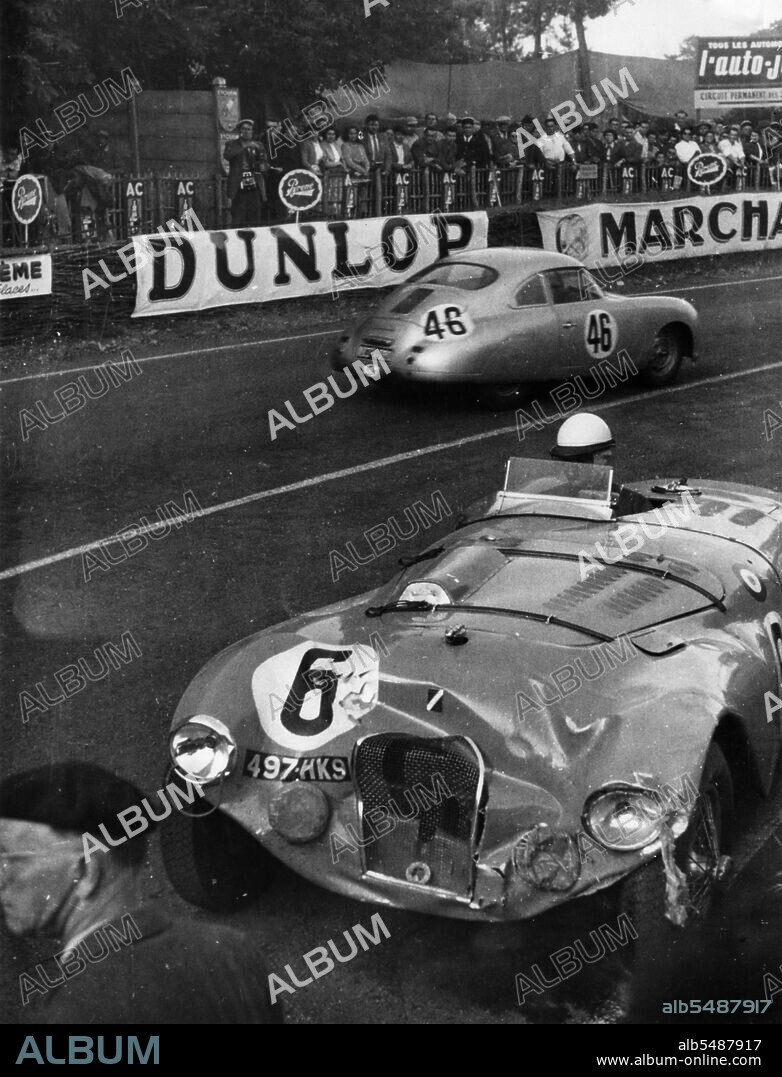 UNKNOWN. Crashed Talbot Lago of Andre Chambas and Charles de Cortanze, Le Mans 24 Hour Race, France, 1953. The Porsche 356 of Gonzague Olivier and Eugene Martin passes in the background.