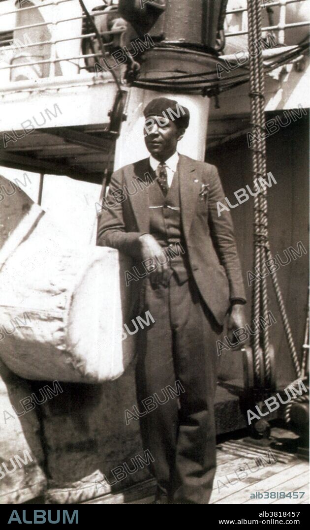Undated photograph of Hayden aboard unidentified ship. Palmer C. Hayden (January 15, 1890 - February 18, 1973) was an American painter who depicted African-American life. He was originally called Peyton Cole Hedgeman. He grew up in the town of Widewater, Virginia, and was a self-trained artist. He worked as a laborer for the Buffalo Bill Circus, then the Ringling Brothers Circus. Afterwards, he joined the Army's black Company a, 24th Infantry regiment, and was stationed in the Philippines. He worked as a deliveryman at West Point Academy during WWI, and while there he was given the name Palmer Hayden by his commanding sergeant. He moved to Greenwich Village after he was discharged to pursue a career in fine arts. He studied at the Cooper Union in New York City and also practiced independent studies at Boothbay Art Colony in Maine. Much of Hayden's influences came from the environment around him. He enjoyed painting, and used his time in Paris for inspiration. Over his next five years in Paris, Hayden was very productive, trying to capture elements of Parisian society. On his return to America, he began working for the United States government. His body of work mostly consists of oil and watercolor paintings, but also includes pen/ink drawings. Most art historians agree that his most influential or well-known works would be the ones which reflect African-American folklore. He died in 1973 at the age of 83.