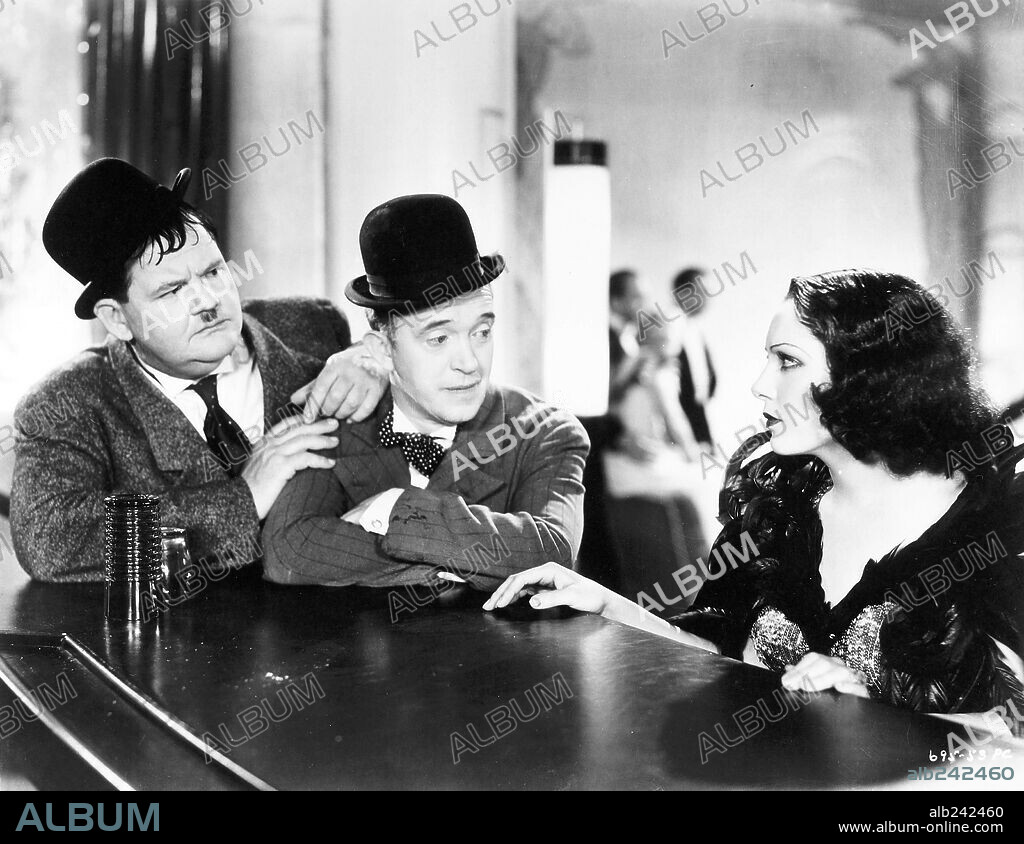 OLIVER HARDY and STAN LAUREL in HOLLYWOOD PARTY, 1934. Copyright M.G.M.