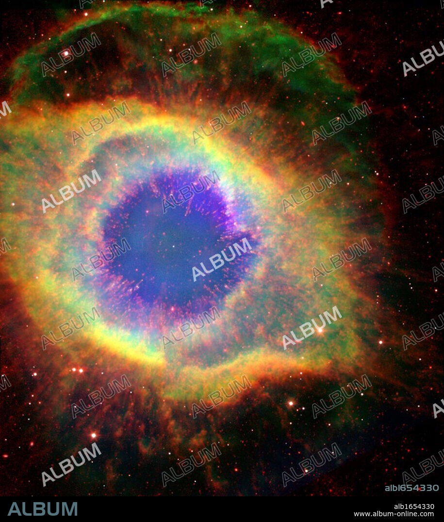 The Helix Nebula (NGC 7293), sometimes called The Eye of God, a large planetary nebula in the constellation Aquarius. Credit: NASA.