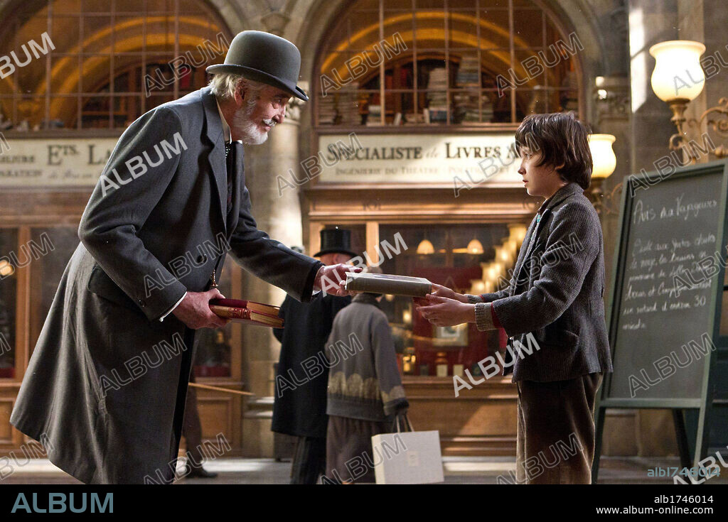 ASA BUTTERFIELD and CHRISTOPHER LEE in HUGO, 2011, directed by MARTIN SCORSESE. Copyright GK FILMS.