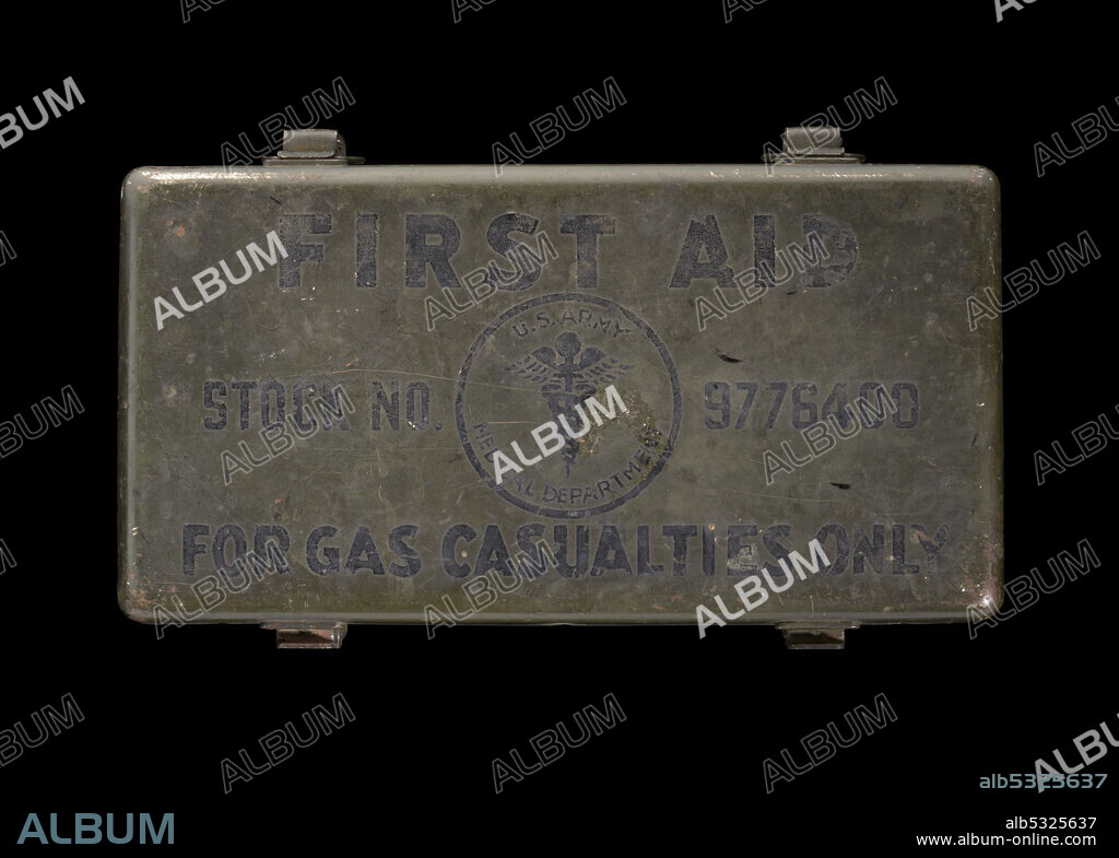 INC. DAVIS EMERGENCY EQUIPMENT CO.. A U.S. Army-issued first aid kit from World War II labeled [For Gas Casualties Only]. The green painted metal box has four latches on each side so, that when open, the lid remains attached to the body. On the top of the kit, text reads, [FIRST AID / STOCK NO. 9776400 / FOR GAS CASUALITIES ONLY]. In the center, the [U.S. ARMY / MEDICAL DEPARTMENT] with their insignia of caduceus, or two snakes winding around a winged staff. A label of INSTRCTIONS-GAS CASUALTY KIT] is adhered to the lid interior. Listed are all the items found in the kit and how they should be used.
