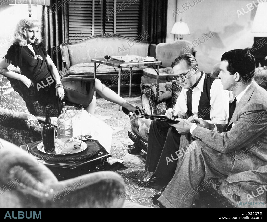 BARBARA STANWYCK y FRED MACMURRAY en PERDICIÓN, 1944 (DOUBLE INDEMNITY), dirigida por BILLY WILDER. Copyright PARAMOUNT PICTURES.