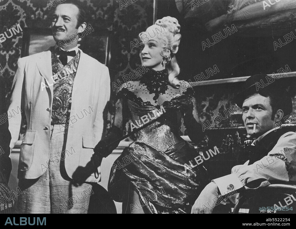 DAVID NIVEN, FRANK SINATRA and MARLENE DIETRICH in AROUND THE WORLD IN EIGHTY DAYS, 1956, directed by MICHAEL ANDERSON. Copyright UNITED ARTISTS.