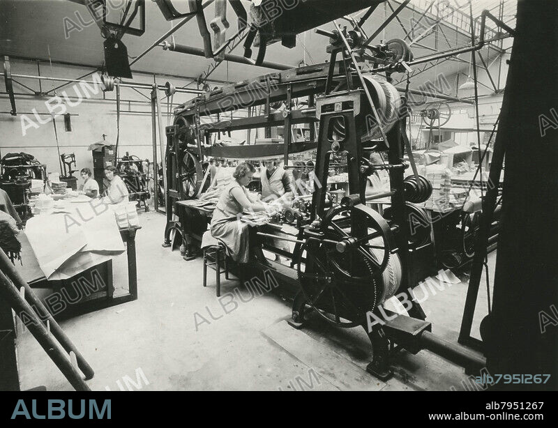 UNKNOWN PHOTOGRAPHER. View of a machine to glue and dry the envelopes at Schack et Cie, an envelope factory, 10 rue de Palikao, Paris (France). Ca. 1935.