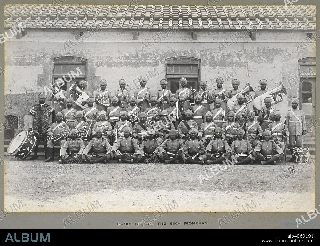 D. N. & SONS BALI. A formal group portrait of Band 1st Bn. the Sikh Pioneers [Sialkot]. 1932. Photograph. Source: Photo 724/(7). Language: English.
