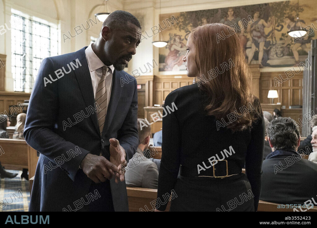IDRIS ELBA and JESSICA CHASTAIN in MOLLY'S GAME, 2017, directed by AARON SORKIN. Copyright STX ENTERTAINMENT/HUAYI BROTHERS PICTURES/PASCAL PICTURES / GIBSON, MICHAEL.