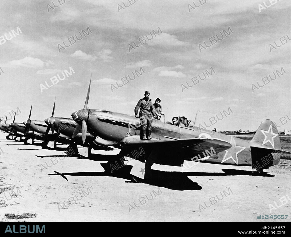 World war 2, soviet air force yakovlev yak-9d fighters lined up on an airfield, the squadron guards the new u, s, bases for aircraft landing in the soviet union. 01/02/2013