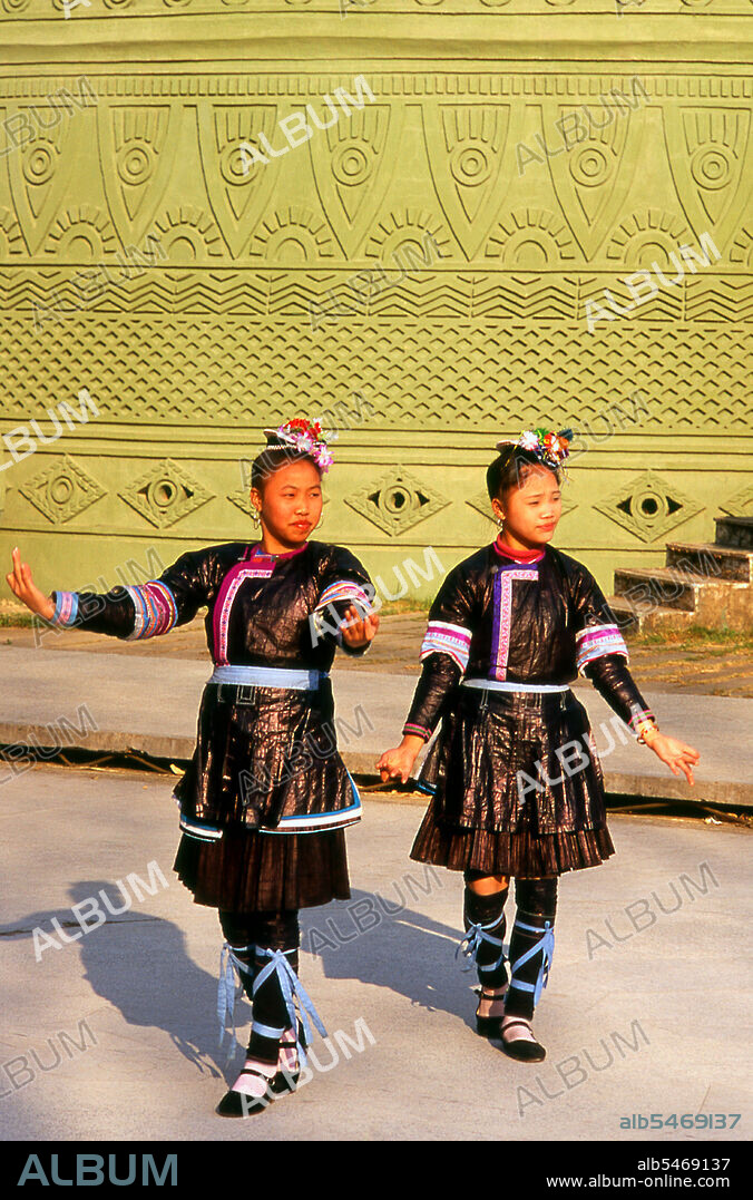 The Dong, a Kam-Sui people of southern China, are one of the 56 ethnic groups officially recognized by the People's Republic of China. They are famed for their native-bred Kam Sweet Rice, carpentry skills, and unique architecture, in particular a form of covered bridge known as the 'wind and rain bridge'. The Dong people live mostly in eastern Guizhou, western Hunan, and northern Guangxi provinces. Small pockets of Dong speakers are also found in Tuyen Quang province, northern Vietnam. Nanning was originally founded during the Yuan Dynasty (1271 - 1368), although there was a county seat here called Jinxing as far back as 318 CE. Opened to foreign trade by the Chinese in 1907, Nanning grew rapidly. From 1912 to 1936 it was the provincial capital of Guangxi, replacing Guilin. Due to its proximity to the Vietnamese border Nanning became a major centre for supplying Ho Chi Minh's North Vietnam during the Second Indochina War (Vietnam War).