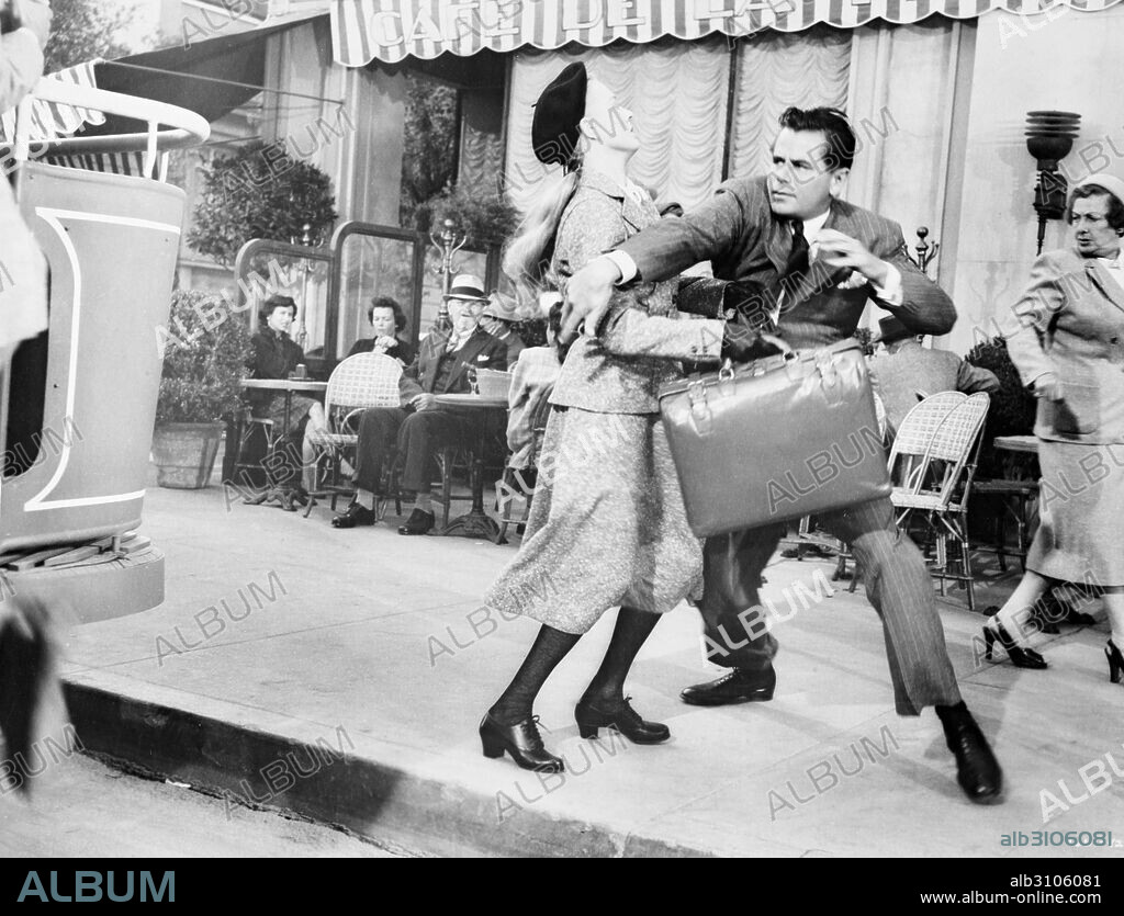 GLENN FORD in INTERRUPTED MELODY, 1955, directed by CURTIS BERNHARDT. Copyright M.G.M.