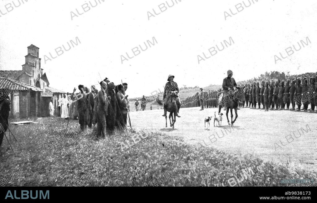 'Conquest of German East Africa; On May 8, 1916, Belgian Colonel Molitor entered Kigali, capital of Rwanda, a region bordering the Northern Part of the Belgian Congo', 1916. From "L'Album de la Guerre 1914-1919, Volume 2" [L' Illustration, Paris, 1924].