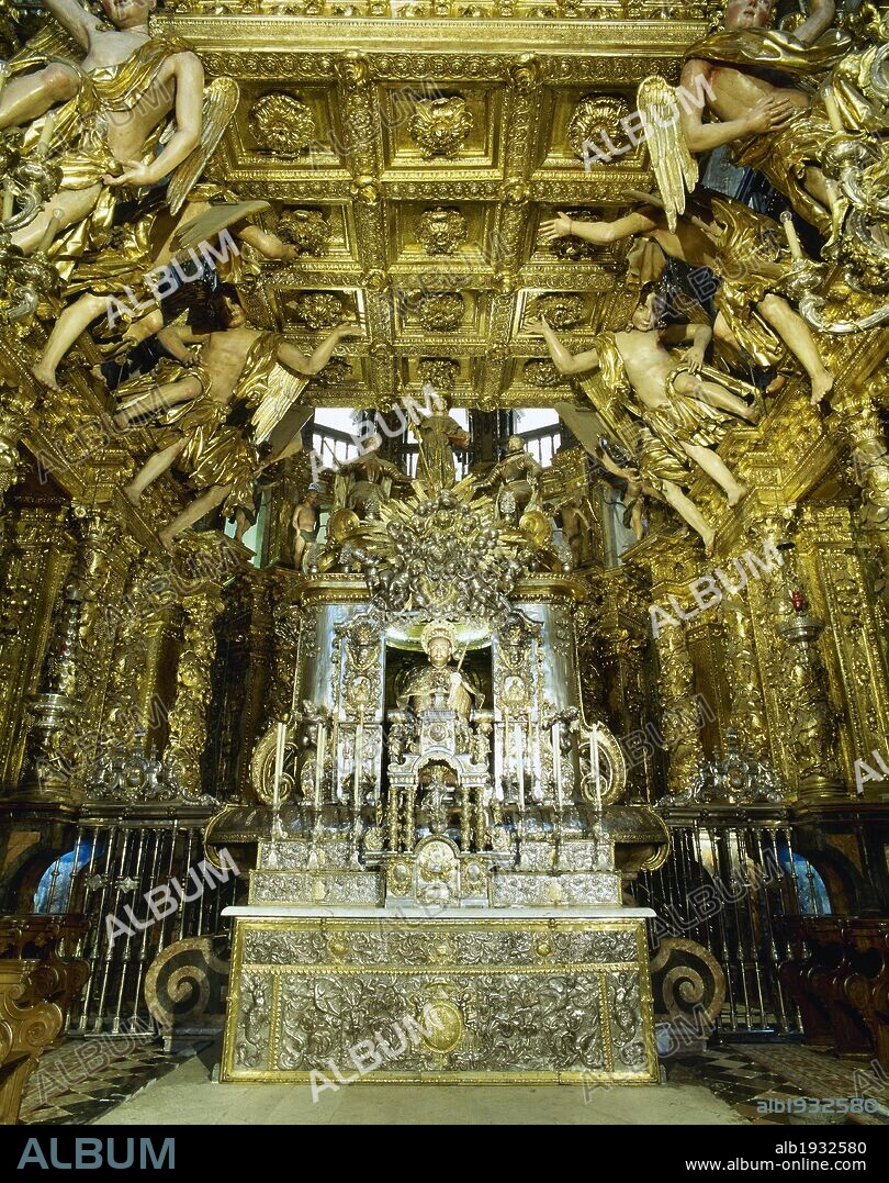 Main altar of the Cathedral of Santiago de Compostela. Gothic altar remodeled in exuberant baroque by Jose Vega y Verdugo. The Baldachin,17th century, author Domingo de Andrade (1639-1712). A bejeweled medieval statue of St. James (12th century). Santiago de Compostela Cathedral. Santiago de Compostela, province of La Coru–a, Galicia, Spain.