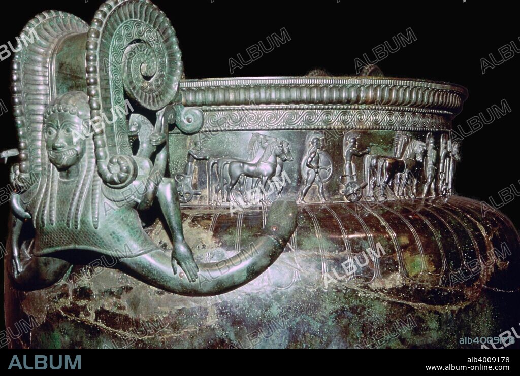 Detail of a Greek bronze vessel for mixing wine found in a rich Celtic chariot-burial at Vix near Chatillon-sur-Seine, France. It is the largest metal vessel known in antiquity, 6th century BC.