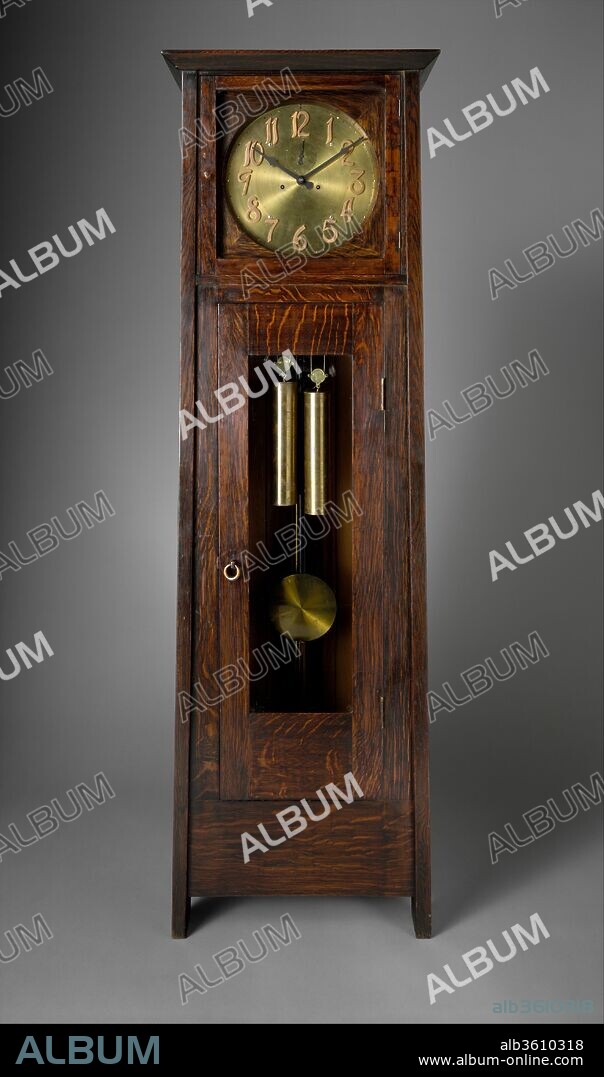 Tall Clock. Artist: Gustav Stickley (American, Osceola, Wisconsin 1858-1942 Syracuse, New York). Culture: American. Dimensions: H. 74 in. (188 cm). Date: ca. 1902.
A study in simplicity and proportion, this tall clock embodies the arts and crafts principles of Gustav Stickley. The rectilinear and subtly trapezoidal form, the rich grain of the oak case, and the bold clock face contribute to its successful design.
