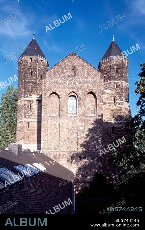 St Maria im Kapitol, Cologne. (St Mary's in the Capitol), built between 1040 and. 1065. Exterior view of the westwork and spires. Photo.