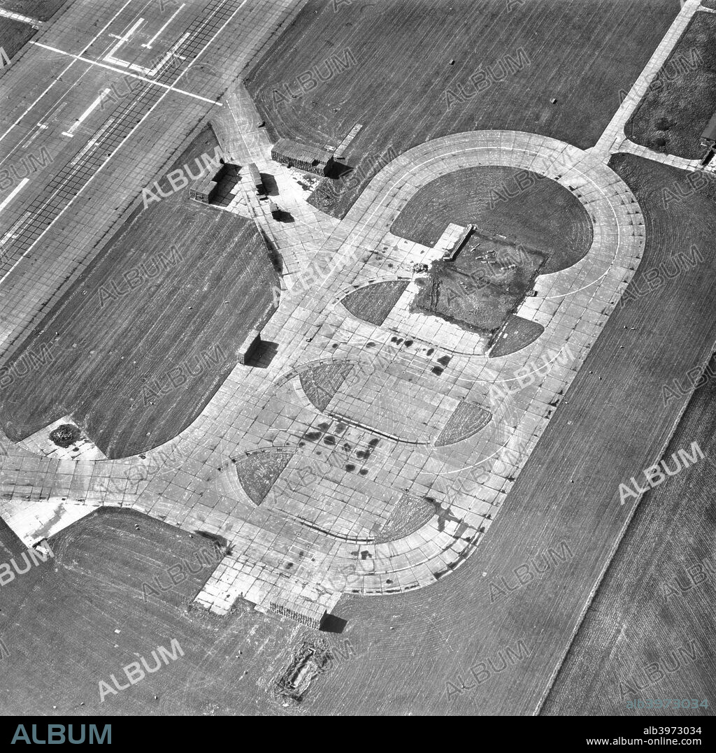Bedford Airfield, Bedfordshire, 2000. Thurleigh Airbase hosted the 8th US Air Force during the Second World War and was known as station 111. Shortly after the War, Thurleigh was developed as a testing facility, including wind tunnels and a five mile long runway. The base, of which this turning apron is part, closed in 1993.