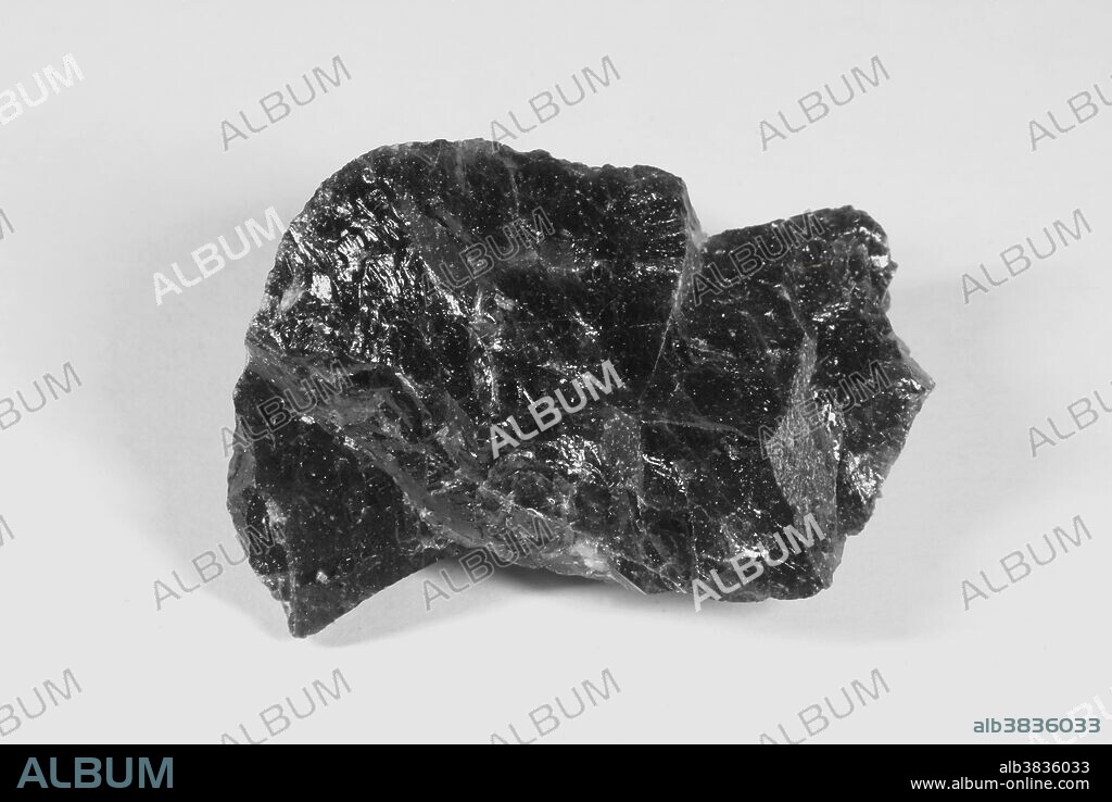 Pitchstone is a volcanic (extrusive) igneous rock formed by the rapid cooling of rhyolitic lavas, and has a resinous or pitchy appearance. It has a glassy, aphanitic texture.