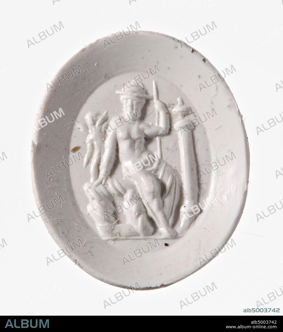 Vz: the god is naked except a himation around his legs, he has a petasos on his head and a scepter in his right hand, on his left and sitting on the rock where Hermes is standing, a small Eros, on his right side a short column with a vase, gem, intaglio, ringstone, agate, nicolo, Color: black.