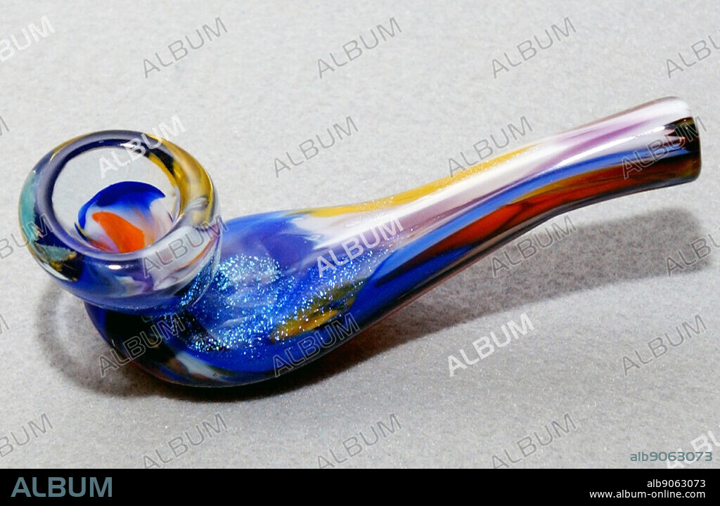 A glass Meth Pipe for inhaling Methamphetamine (also called methylamphetamine, desoxyephedrine, Crystal Meth (or just meth) a man-made stimulant drug.