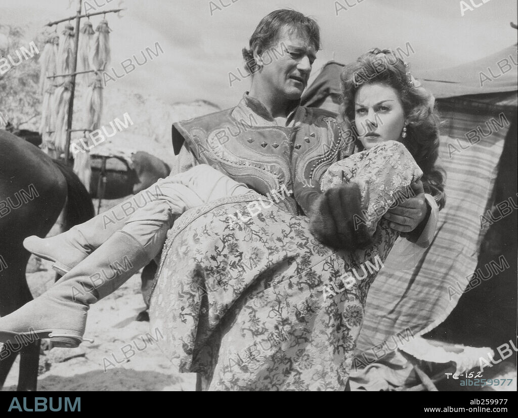 JOHN WAYNE y SUSAN HAYWARD en EL CONQUISTADOR DE MONGOLIA, 1956 (THE CONQUEROR), dirigida por DICK POWELL. Copyright RKO.