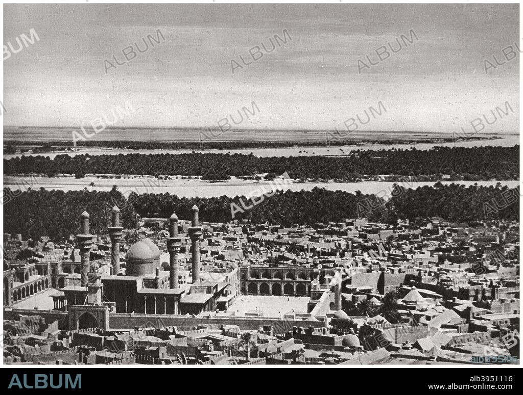 The Kadhimiya, the holy city near Baghdad, from an aeroplane, Iraq, 1925. RAF official photograph. Today a suburb of Baghdad, the Kadhimiya is a holy city to Shia Muslims. Two of the Shia Imams are buried there within the al-Kadhimiya Mosque, which can be seen in the lower left of the photograph. It was built in the 16th century. A print from Baghdad, Camera Studio Iraq, published by Hasso Bros, Rotophot AG, Berlin, 1925.