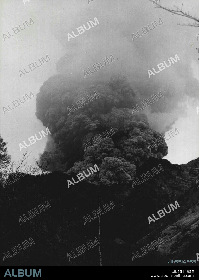 Man's Curiosity And Science Tactile Violent Volcano -- A close view of Mt. Asama belching forth fire and smoke -- as close as you could approach without getting scorched, and maybe horribly deluged if the wind decides to blow hitherward. October 1, 1939. (Photo by Japan Photo Library).