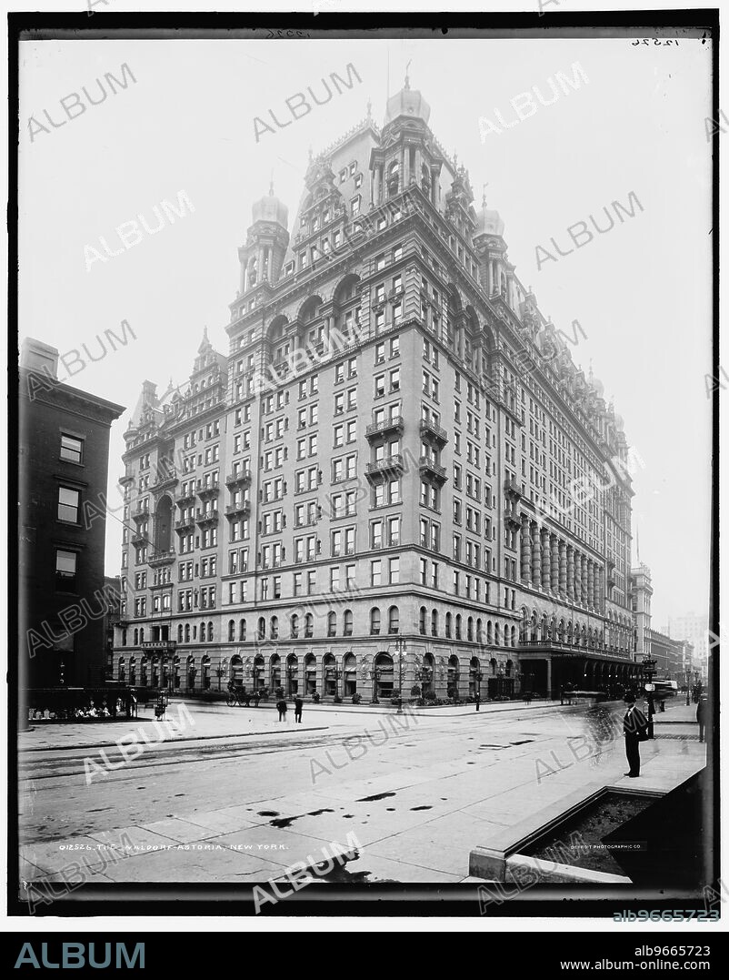 The Waldorf-Astoria, New York, c1900. Two hotels side-by-side: the Waldorf Hotel opened in 1893, and the Astoria opened in 1897. They were merged into the Waldorf-Astoria, connected by a 300 metres (980 ft) long corridor, known as 'Peacock Alley'. The merger gave the joint hotel 1,300 bedrooms, making it the largest hotel in the world at the time. The Waldorf-Astoria was demolished in 1929 to make way for construction of the Empire State Building.
