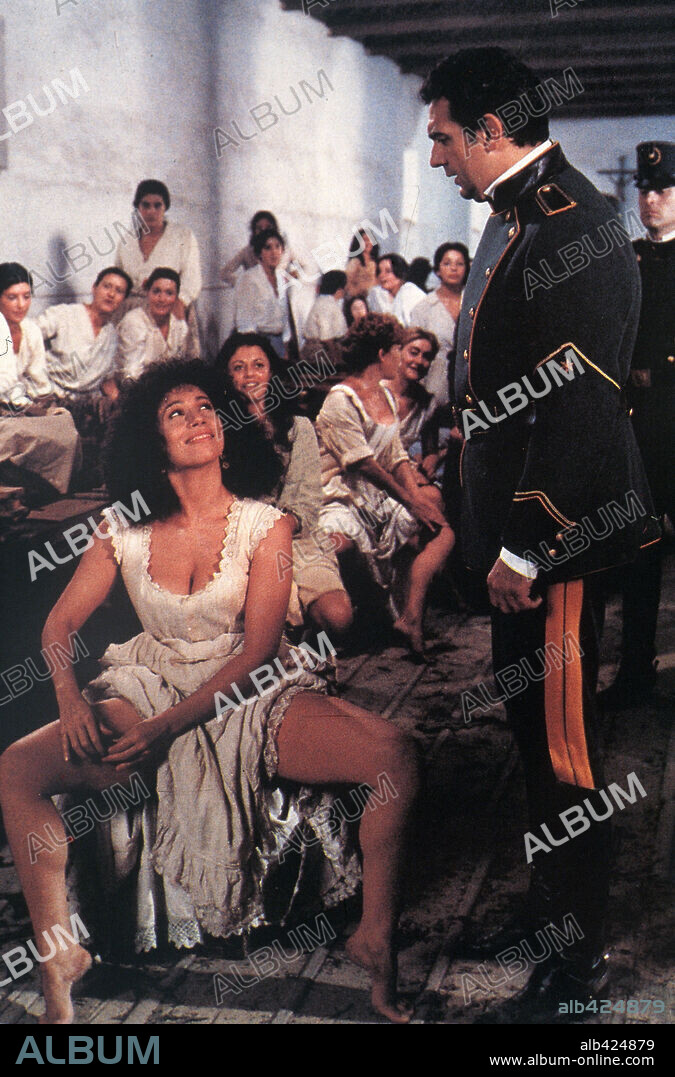 JULIA MIGENES and PLACIDO DOMINGO in BIZET'S CARMEN, 1984 (CARMEN), directed by FRANCESCO ROSI. Copyright OPERA/GAUMONT.