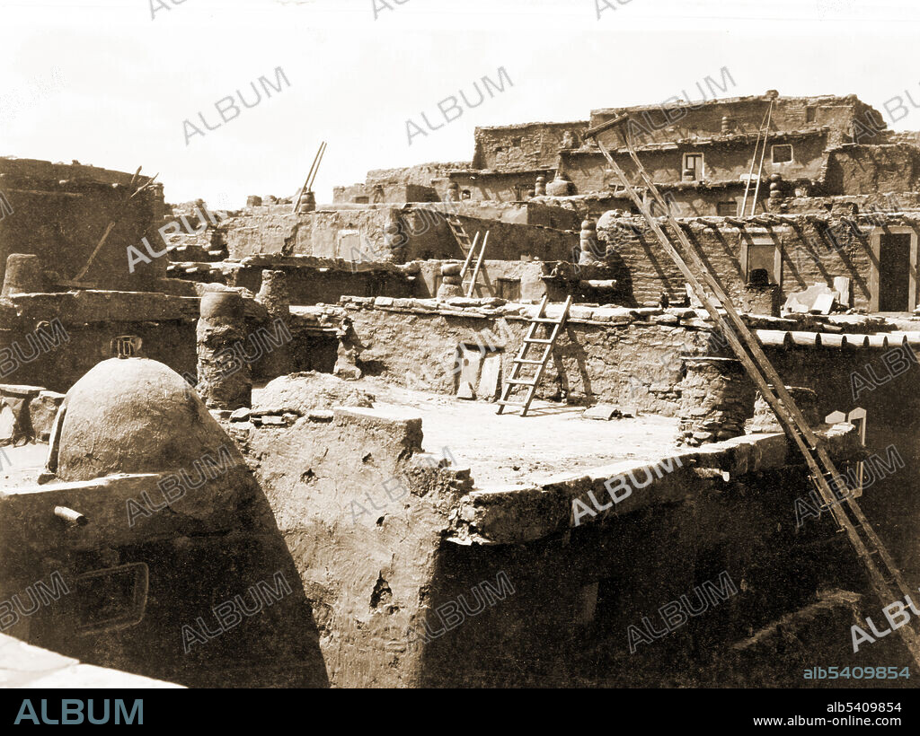 The terraced adobe houses of Zuni Pueblo, New Mexico, photographed by Edward S. Curtis, circa 1903.