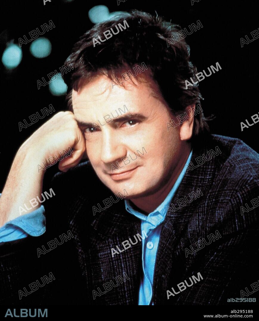 DUDLEY MOORE in CRAZY PEOPLE, 1990, directed by TONY BILL. Copyright PARAMOUNT PICTURES.
